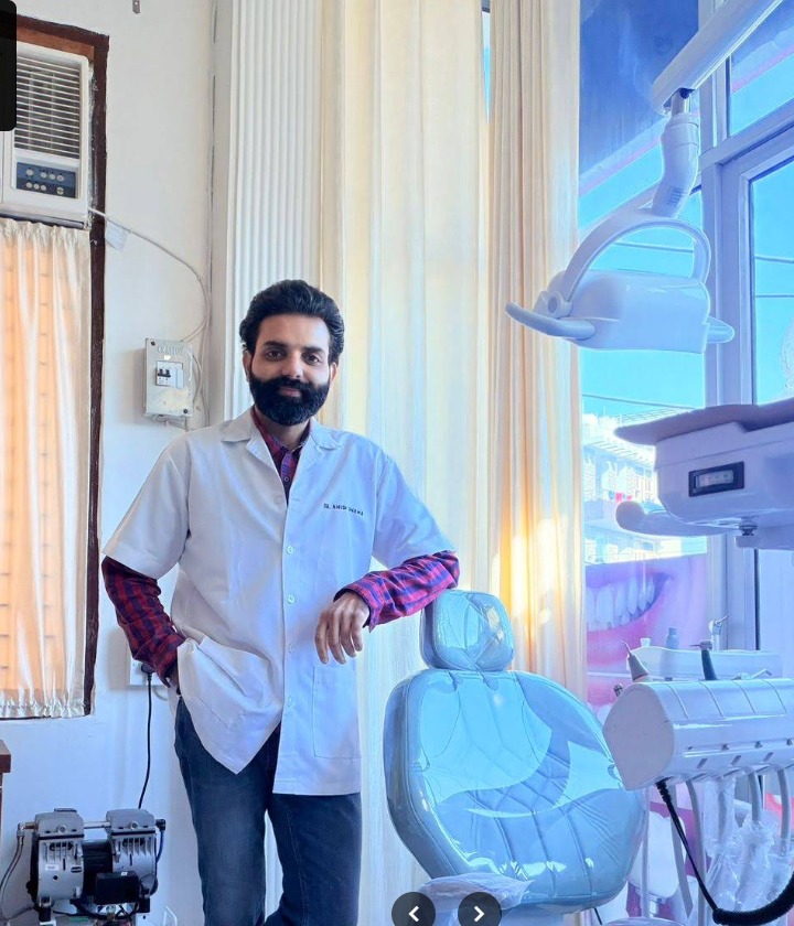 Dr. Anish Sharma with advanced dental equipment